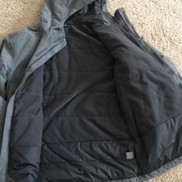 Men’s grey North Face rain jacket